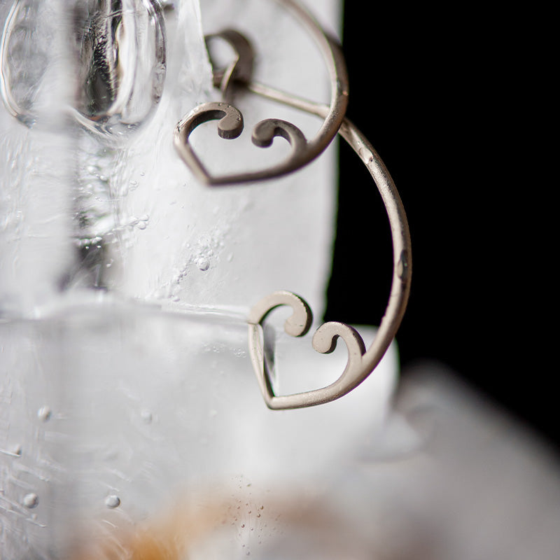 EROS STUD EARRINGS